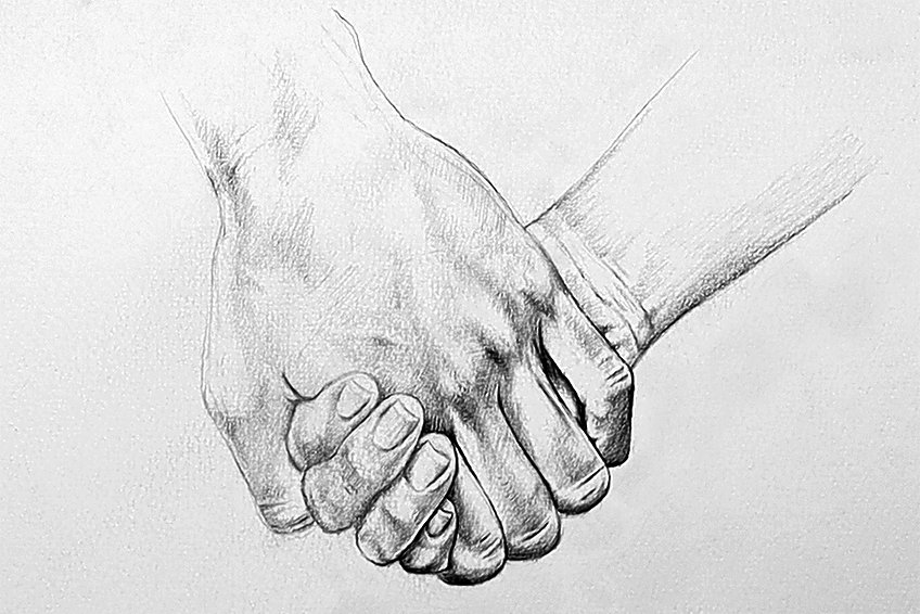 hands holding drawing