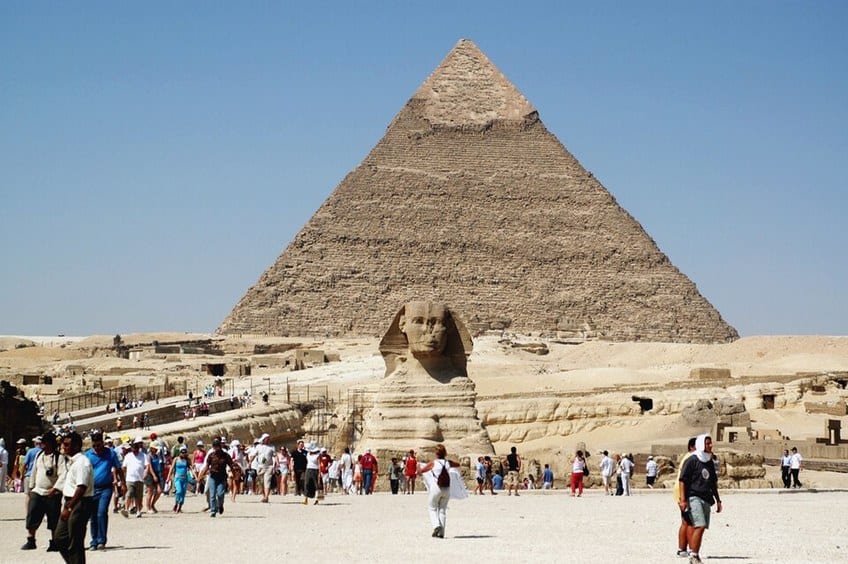 The Great Sphinx of Giza with tourists for scale